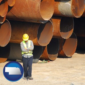 a municipal engineer with iron sewer pipes - with Nebraska icon