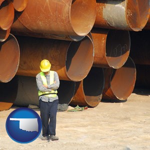 a municipal engineer with iron sewer pipes - with Oklahoma icon